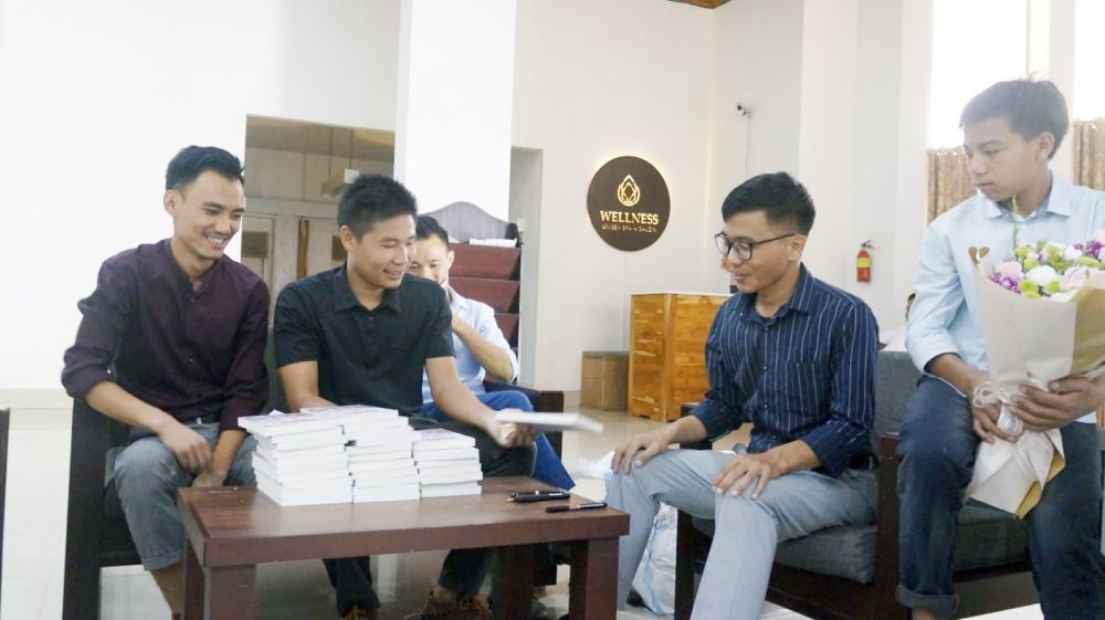 Author of ‘Trophies And Survival’ Hikano H Awomi (right) during the book-signing after his debut book launch held at Hotel Saramati, Dimapur on May 21. (Morung Photo)
